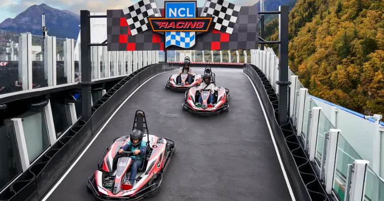The kids will love racing around the top of the ship with the NCL onboard go-karting