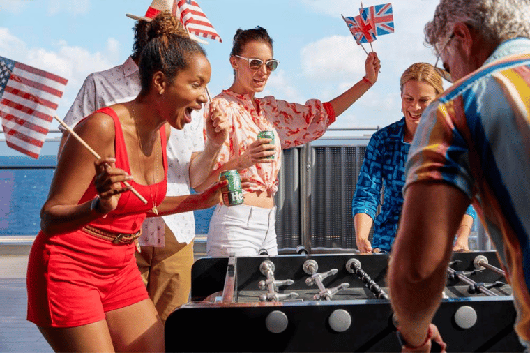 Drinking beer and playing table football onboard Scarlet Lady